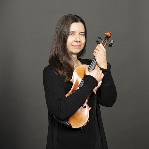 A portrait of Barbara Schaefer and her violin