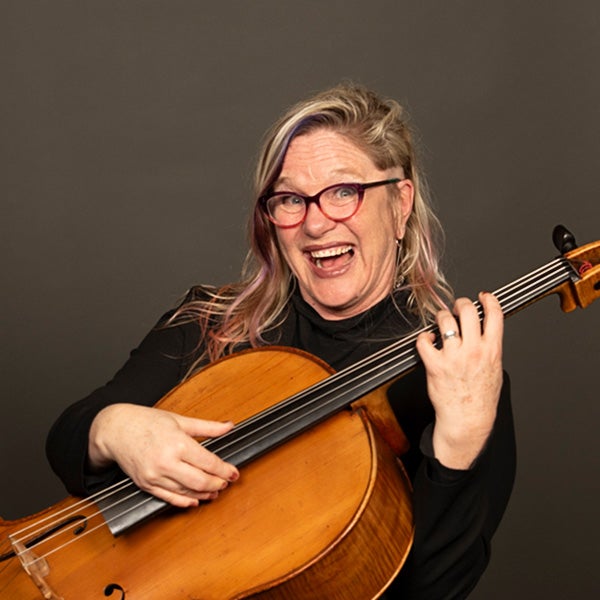 A portrait of Elizabeth Vandervennet and her instrument