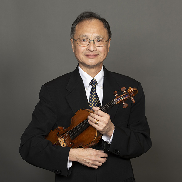 A portrait of Edmond Fong and his violin