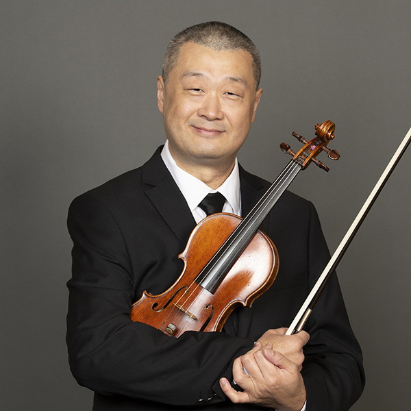 A portrait of Jay Zhong and his violin