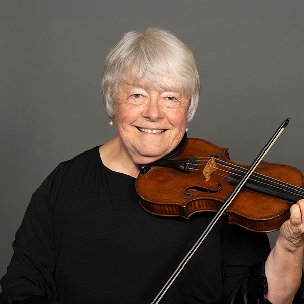 A portrait of Marcia Lotter and her violin.