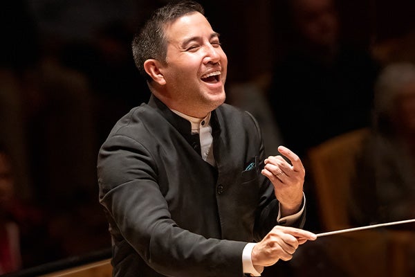 Francesco Lecce-Chong conducting a performance