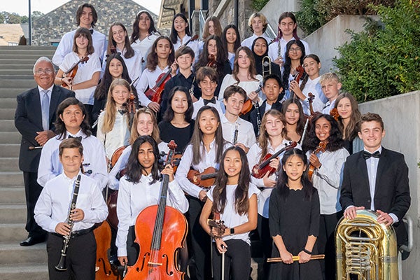 A group shot of youth ensemble outside