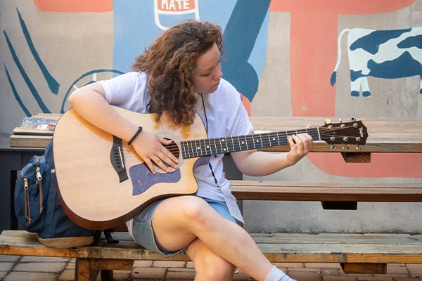 SMA Guitar Workshop young girl playing guitar